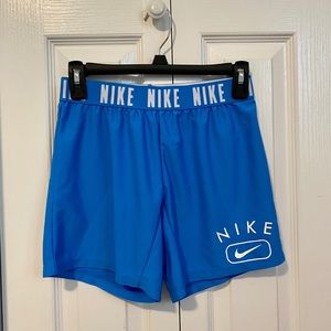 Blue Nike shorts